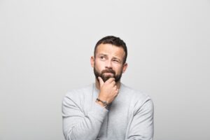 Man Thinking About Attic Insulation